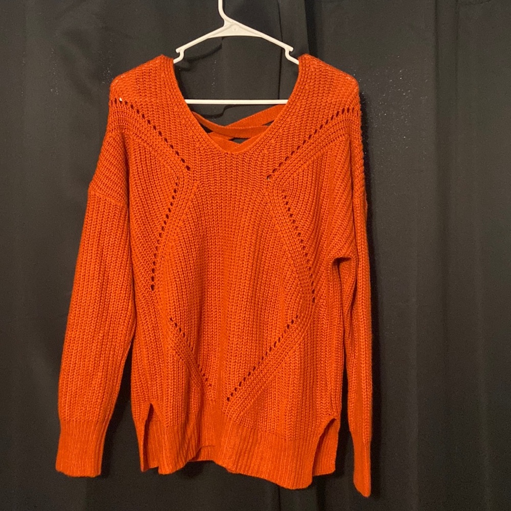 burnt orange fitted sweater with cross back